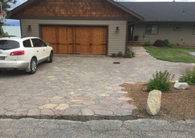 house with new stone driveway