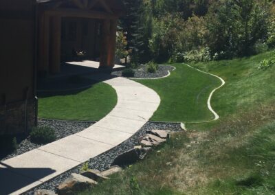 stone walkway with new lawn landscaping
