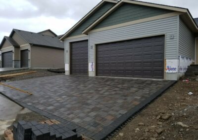 stone pavement in front of garage