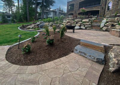 large stone rock landscaping with stone pavement